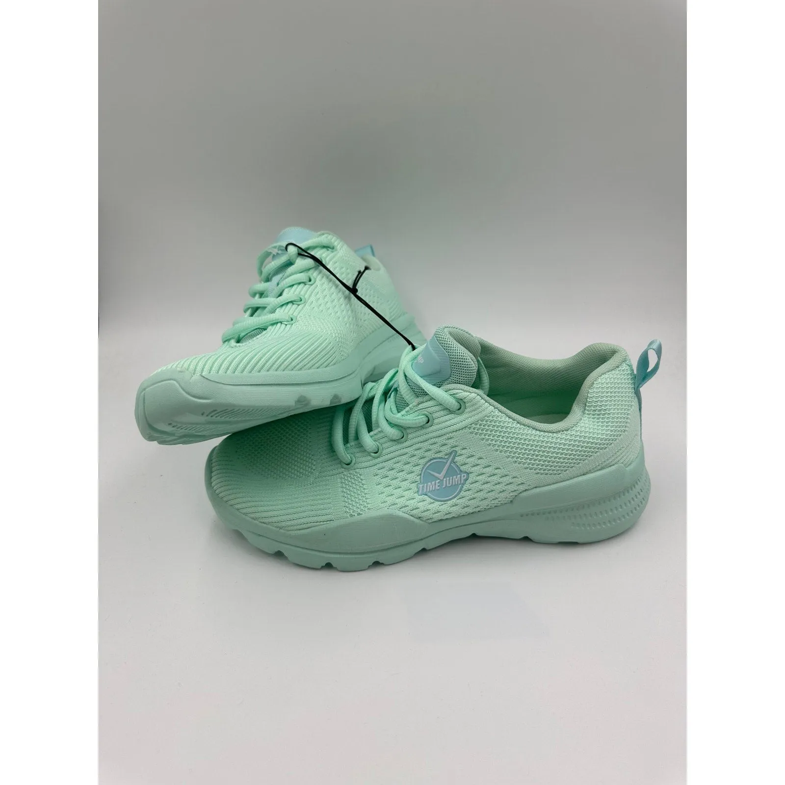 Women's Size 9, Mint Green Low Top Running Sneakers with a Thick Foam Sole