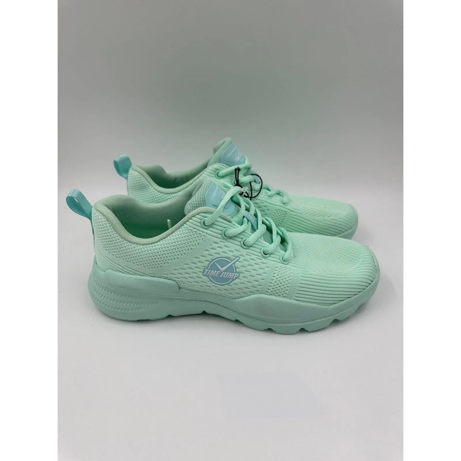 Women's Size 9, Mint Green Low Top Running Sneakers with a Thick Foam Sole