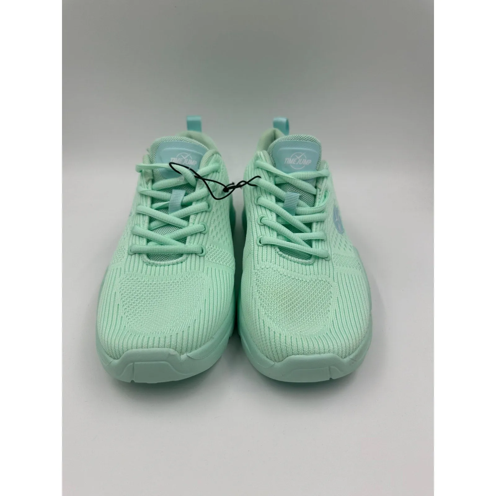 Women's Size 9, Mint Green Low Top Running Sneakers with a Thick Foam Sole