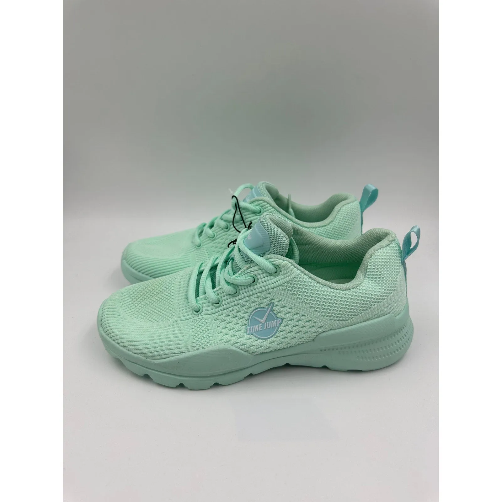 Women's Size 9, Mint Green Low Top Running Sneakers with a Thick Foam Sole