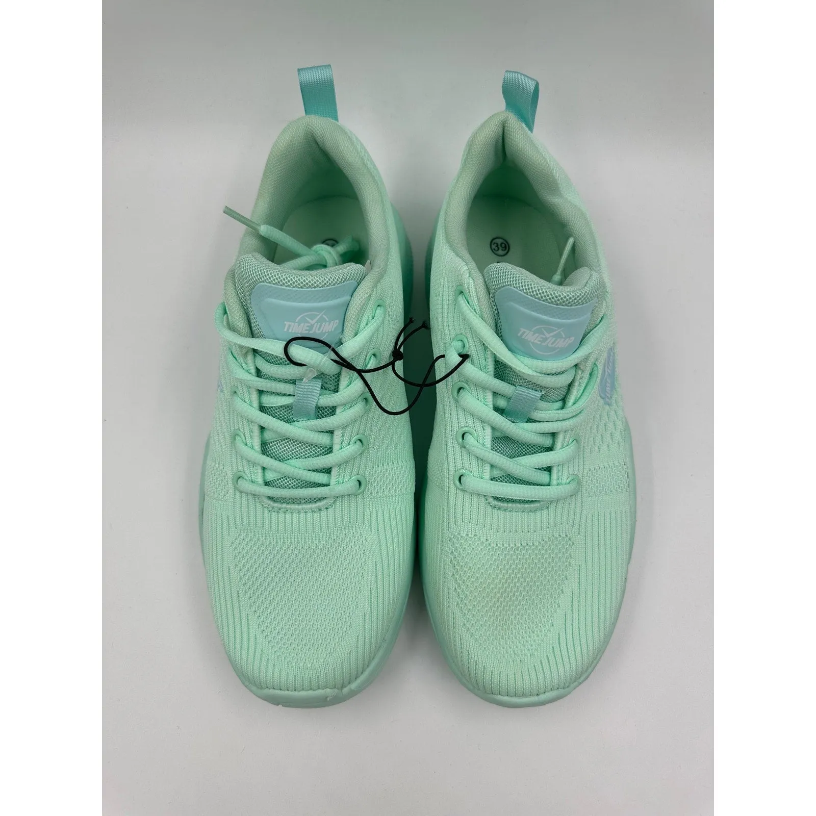 Women's Size 9, Mint Green Low Top Running Sneakers with a Thick Foam Sole